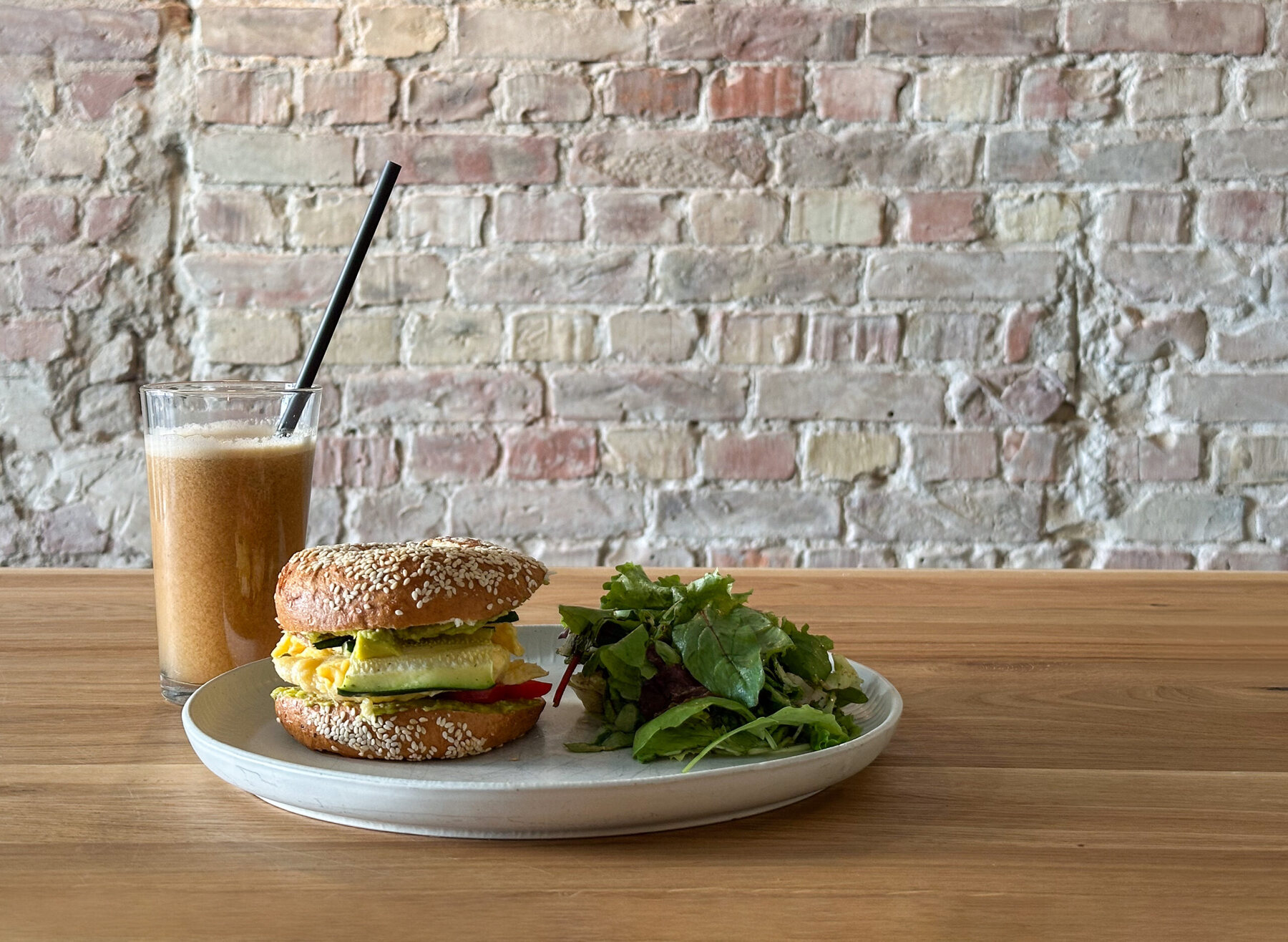 TBS Classic bagel with scrambled eggs, avocado and salad